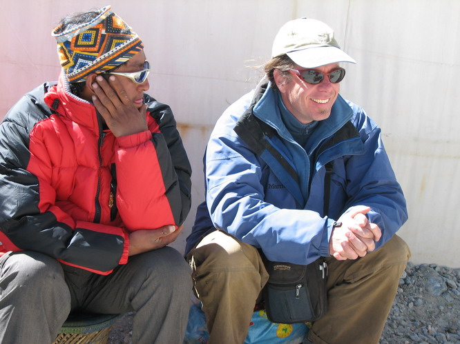 Ray talking with a local merchant. Everest Base Camp, Tibet.